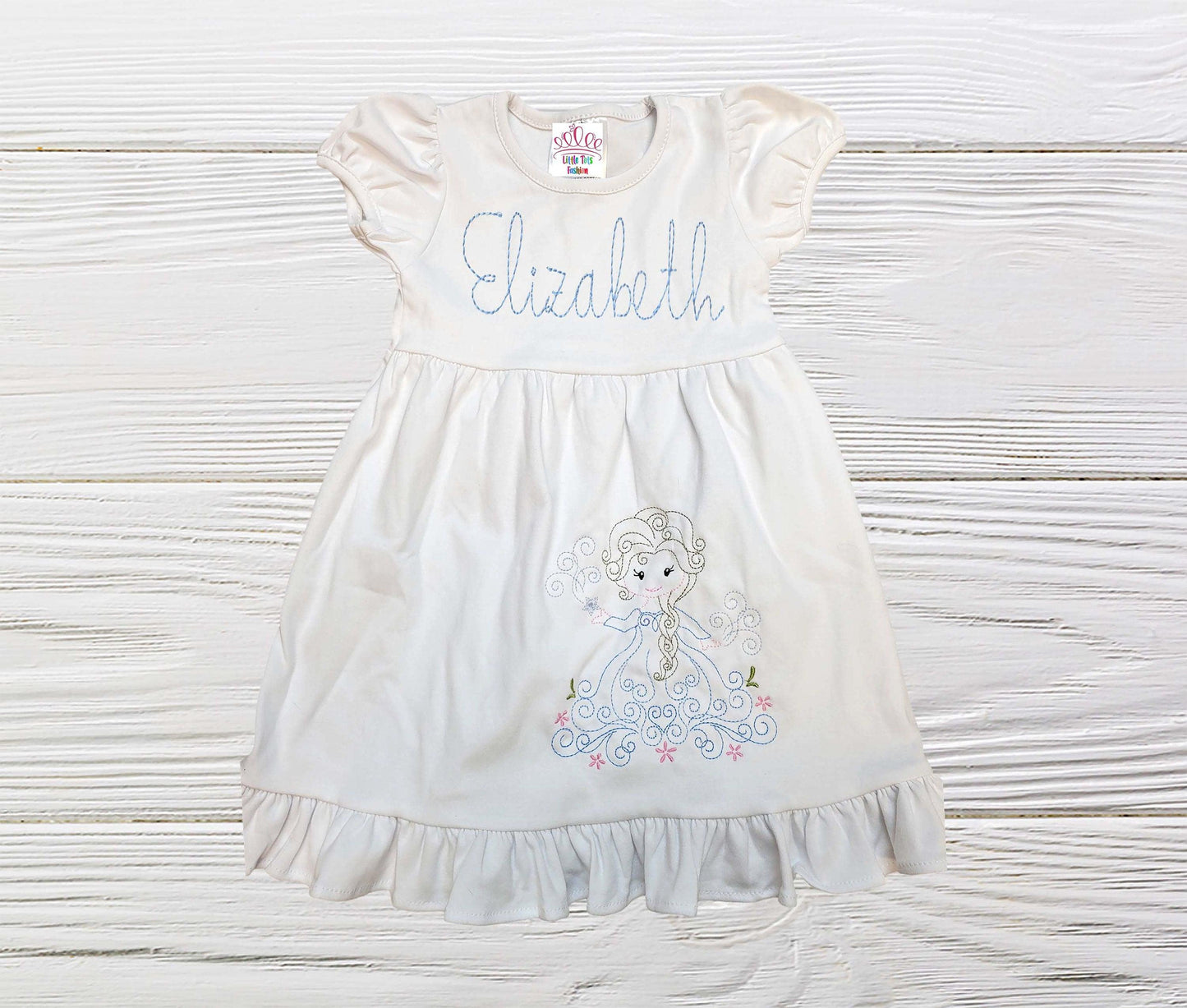 Close-up of the personalized Elsa Frozen Dress with a 'Thank You' message